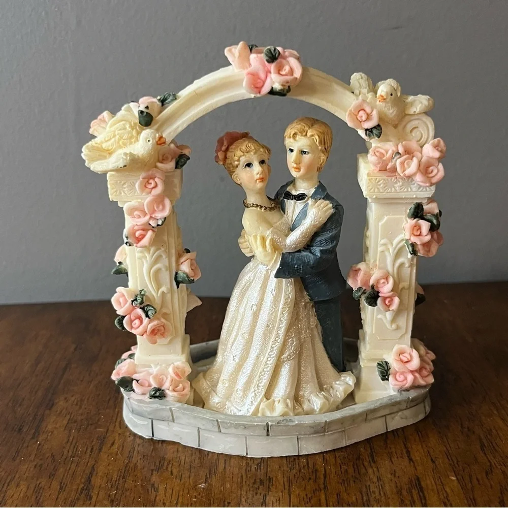Vintage wedding cake topper. Romantic Wedding Couple Figurine